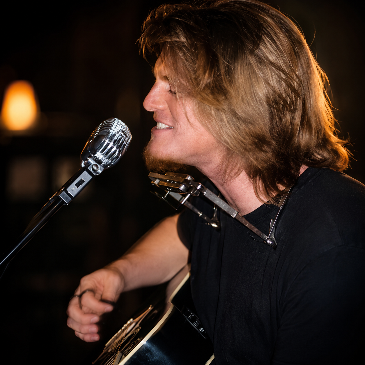 Colten Waddington
            performing with guitar and harmonica